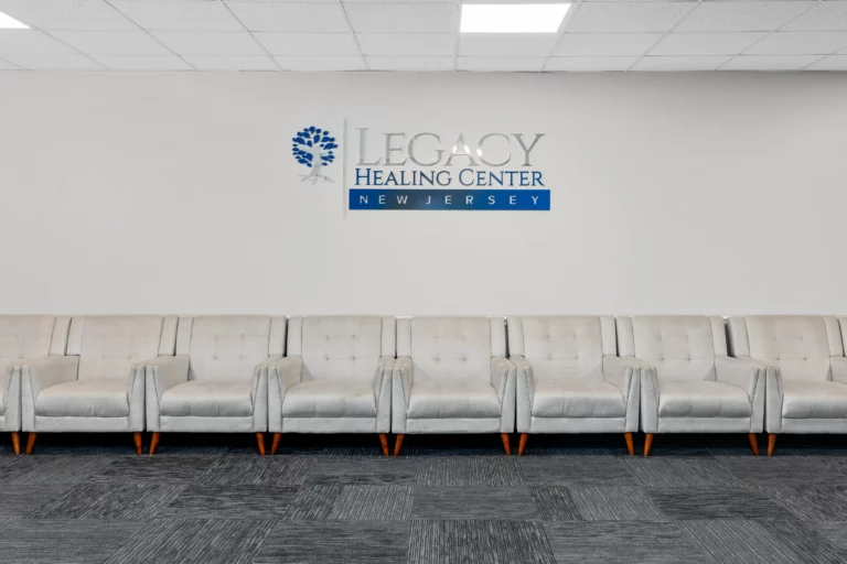 Row of large, comfortable chairs against a wall at Legacy Healing Center’s drug and alcohol rehab center